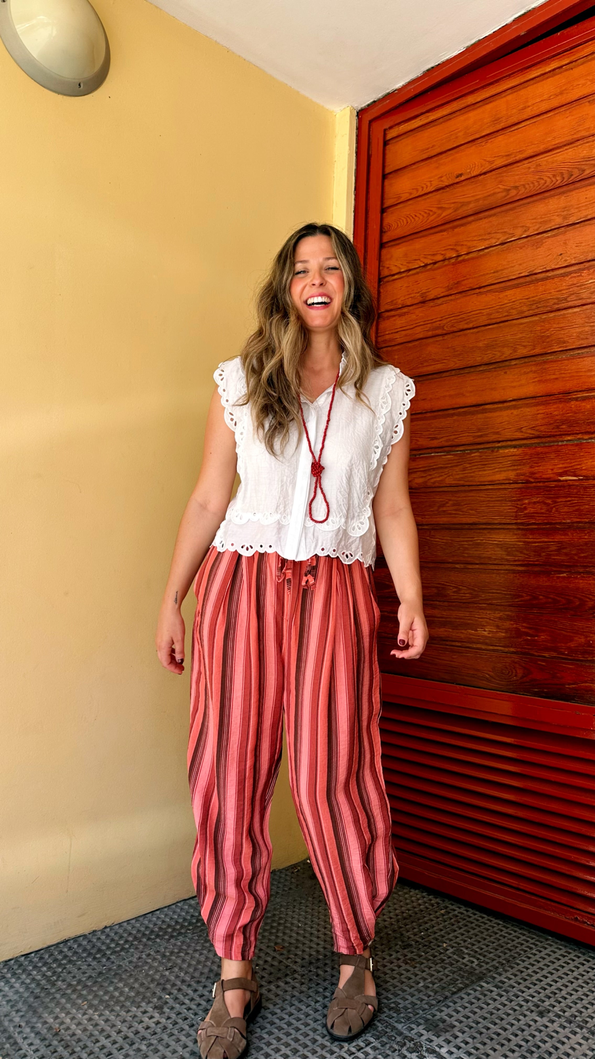 PANTALÓN BOMBACHO RAYAS BOTON BAJO